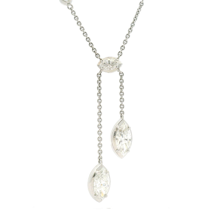 Diamonds by the yard necklace with drop of three marquise diamonds