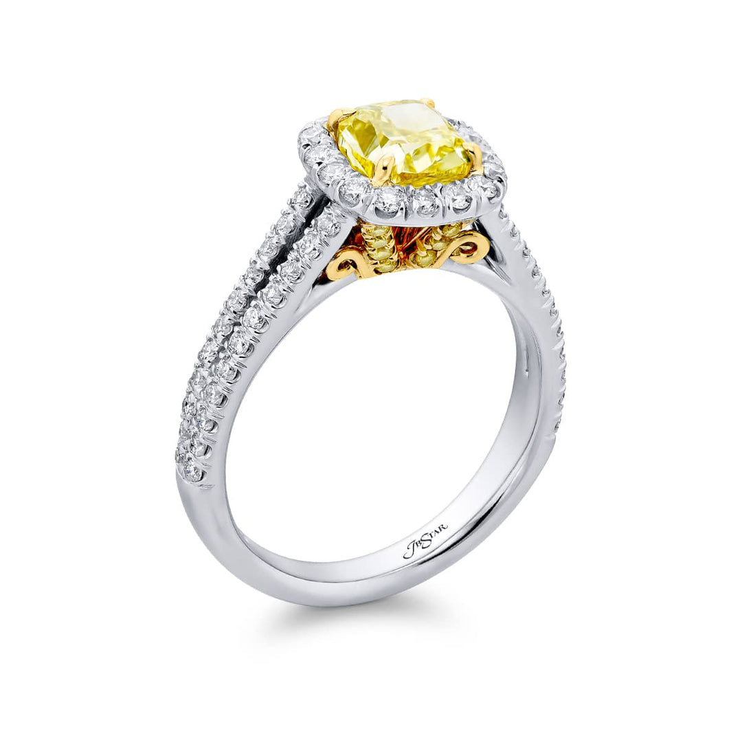 Dazzling Brilliance: Our beautiful 1.19 ct. GIA certified Fancy Yellow Diamond Ring. This cushion-cut fancy yellow diamond accompanied by round diamonds is handcrafted in pure platinum and 18KY gold.
