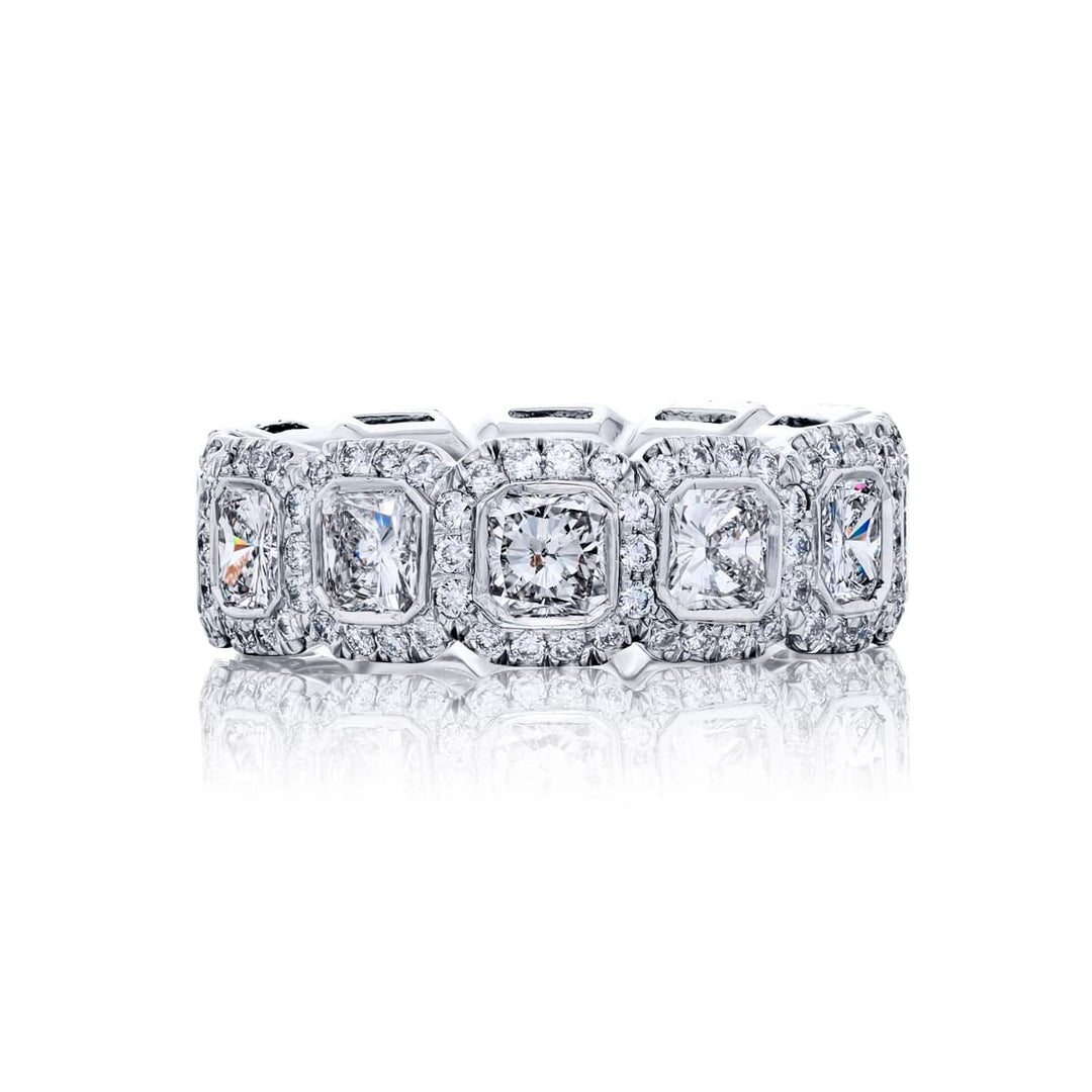 Alluring Eternity: Our beautiful 4.66 ctw. Diamond Eternity Band. These twelve stunning radiant-cut diamonds embraced by micro pave diamonds are handcrafted in pure platinum.