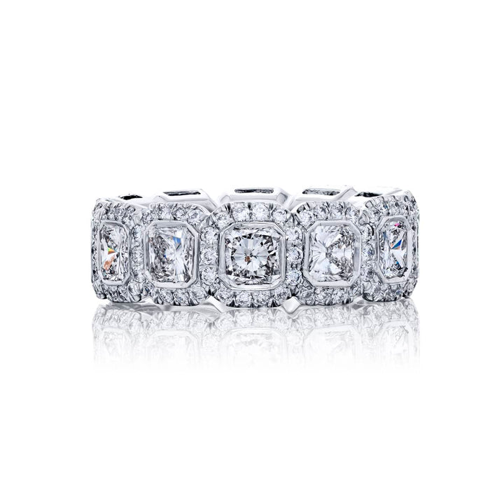 Alluring Eternity: Our beautiful 4.66 ctw. Diamond Eternity Band. These twelve stunning radiant-cut diamonds embraced by micro pave diamonds are handcrafted in pure platinum.