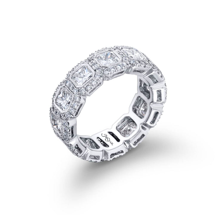 Alluring Eternity: Our beautiful 4.66 ctw. Diamond Eternity Band. These twelve stunning radiant-cut diamonds embraced by micro pave diamonds are handcrafted in pure platinum.