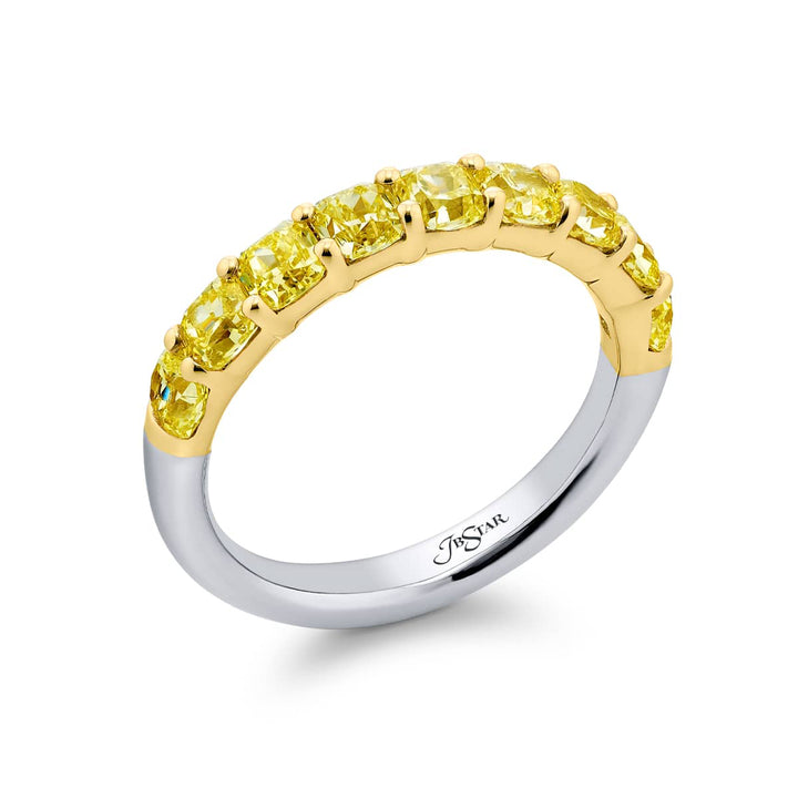 Elegance Elevated: Our classic single row Fancy Yellow Diamond Band. These nine stunning radiant-cut fancy yellow diamonds are handcrafted in 18KY gold and pure platinum.