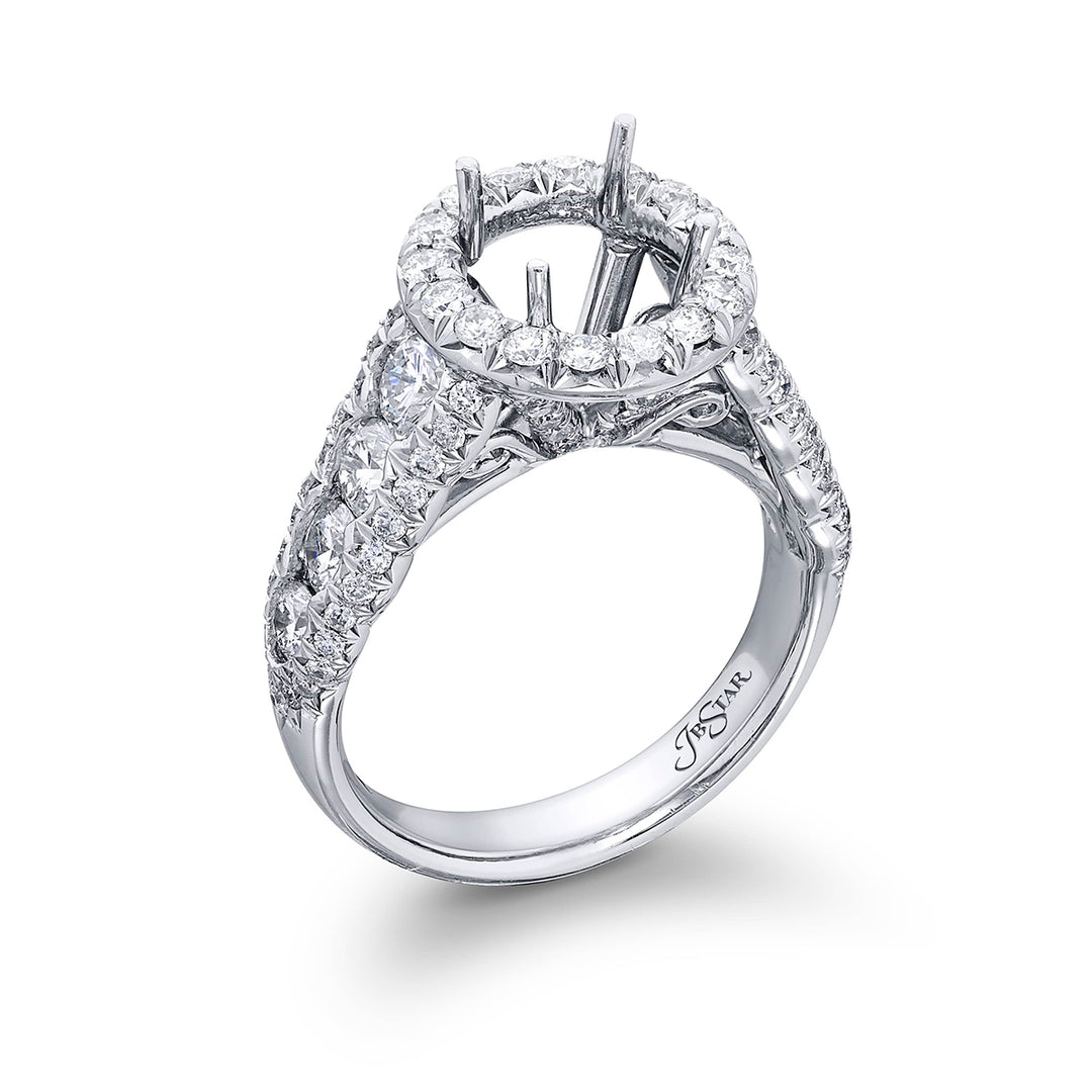 Dazzling Brilliance: Our timeless diamond halo semi-mount. These eight round diamonds are embraced by micro pave diamonds elevating the halo. All handcrafted in pure platinum.