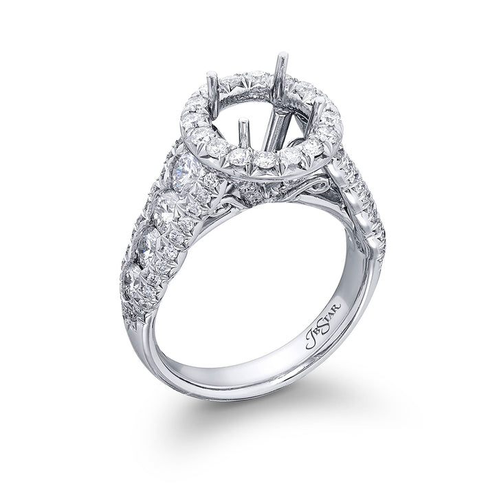 Dazzling Brilliance: Our timeless diamond halo semi-mount. These eight round diamonds are embraced by micro pave diamonds elevating the halo. All handcrafted in pure platinum.
