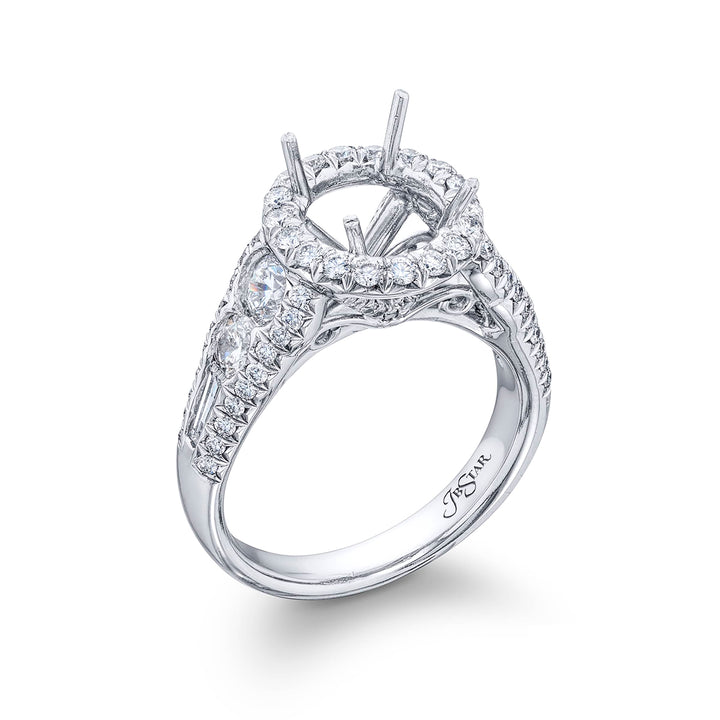 Dazzling Brilliance: Our timeless diamond halo semi-mount. This blend of round and tapered baguette diamonds is embraced by micro pave diamonds elevating the halo. All handcrafted in pure platinum.