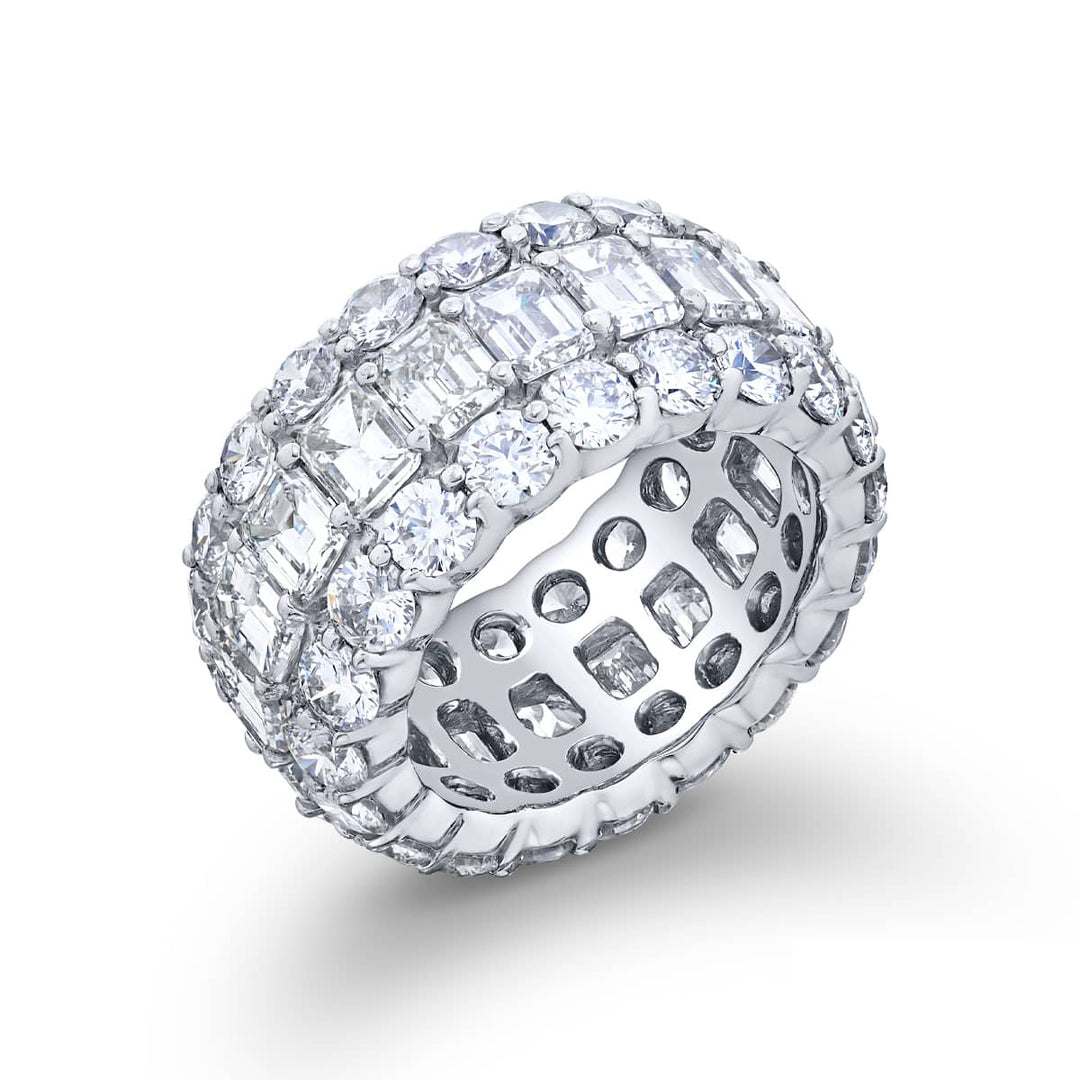 Alluring Eternity: Our beautiful Three-Row Diamond Eternity Band. These stunning emerald-cut diamonds embraced by round diamonds are handcrafted in pure platinum.
