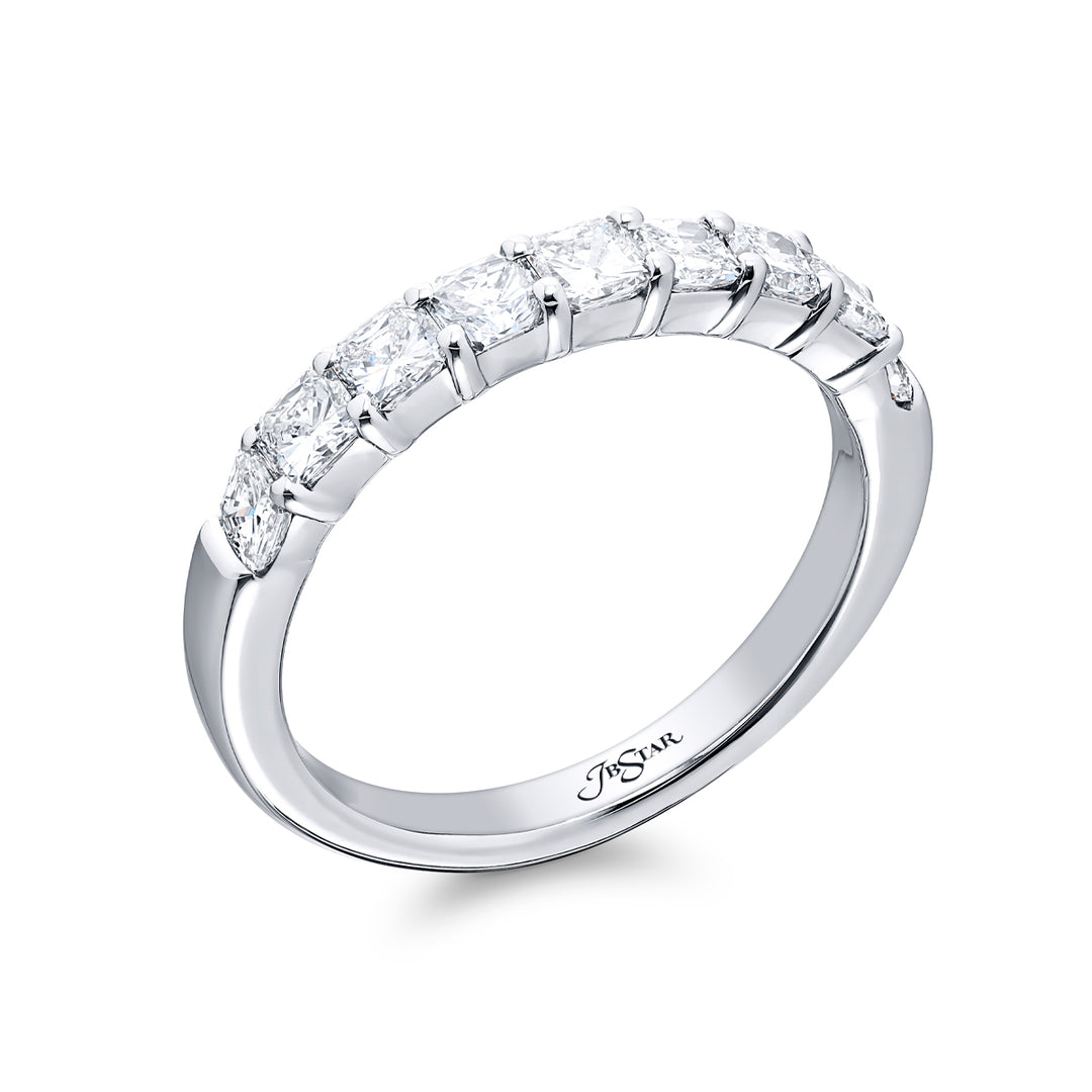 Elegance Elevated: Our classic 1.14 ctw. single row Diamond Band. These nine stunning square emerald-cut diamonds are handcrafted in pure platinum.