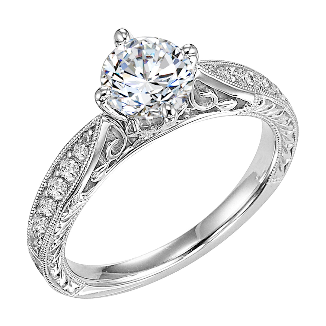 Masterfully crafted, this engagement ring dazzles with its round center stone and prong set diamond band with delicate milgrain and beautiful engraving .  Center Stone is not included.