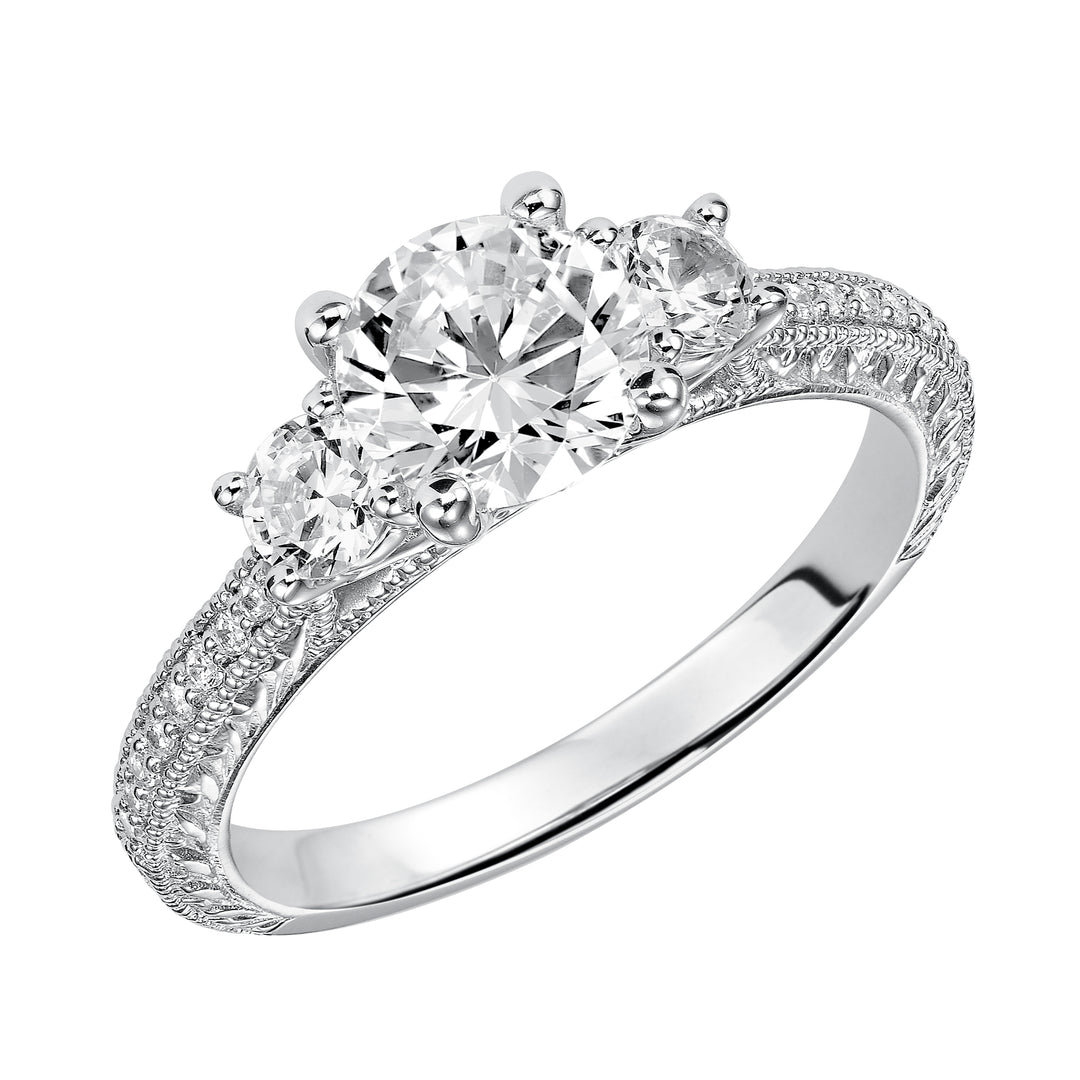 This eye-catching 3-stone engagement sparkles with its diamond prong set band with engraving and milgrain details.  Center Stone is not included.