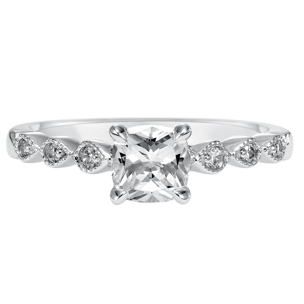 Dazzling with its intricately designed diamond band, this engagement ring is distinct yet enchanting.  Center Stone is not included.