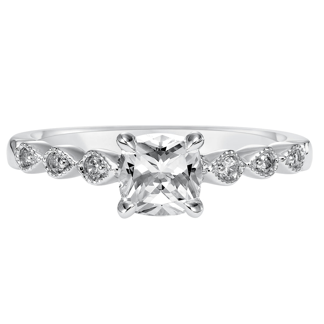 Dazzling with its intricately designed diamond band, this engagement ring is distinct yet enchanting.  Center Stone is not included.
