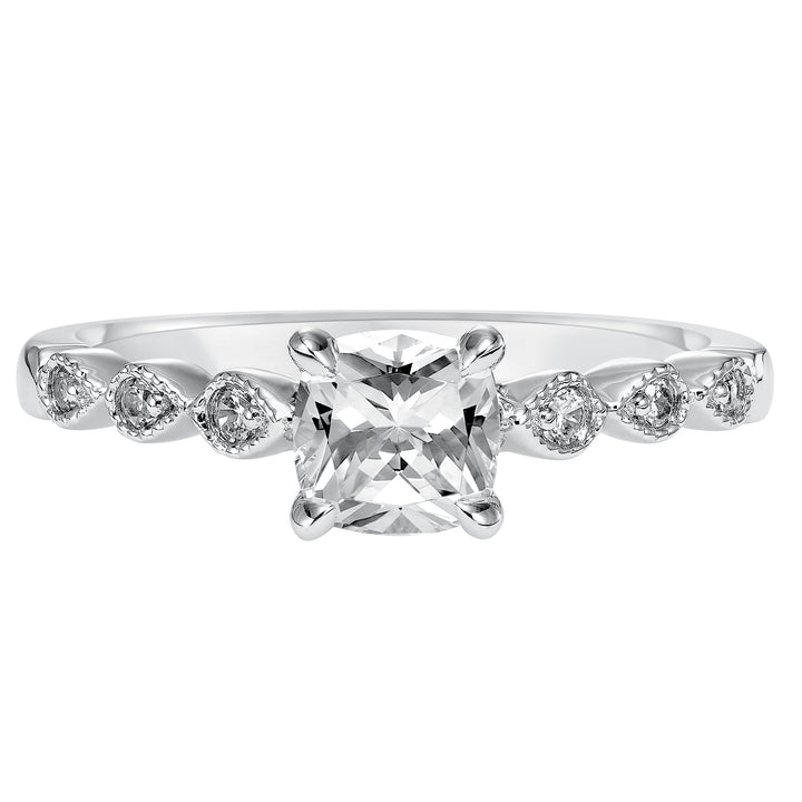 Dazzling with its intricately designed diamond band, this engagement ring is distinct yet enchanting.  Center Stone is not included.