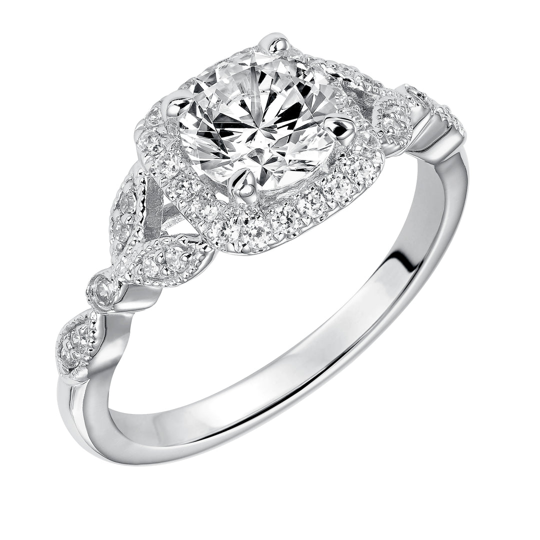This whimsically styled engagement ring sparkles with its filigree and diamond halo and diamond prong set floral-inspired band.  Center Stone is not included.