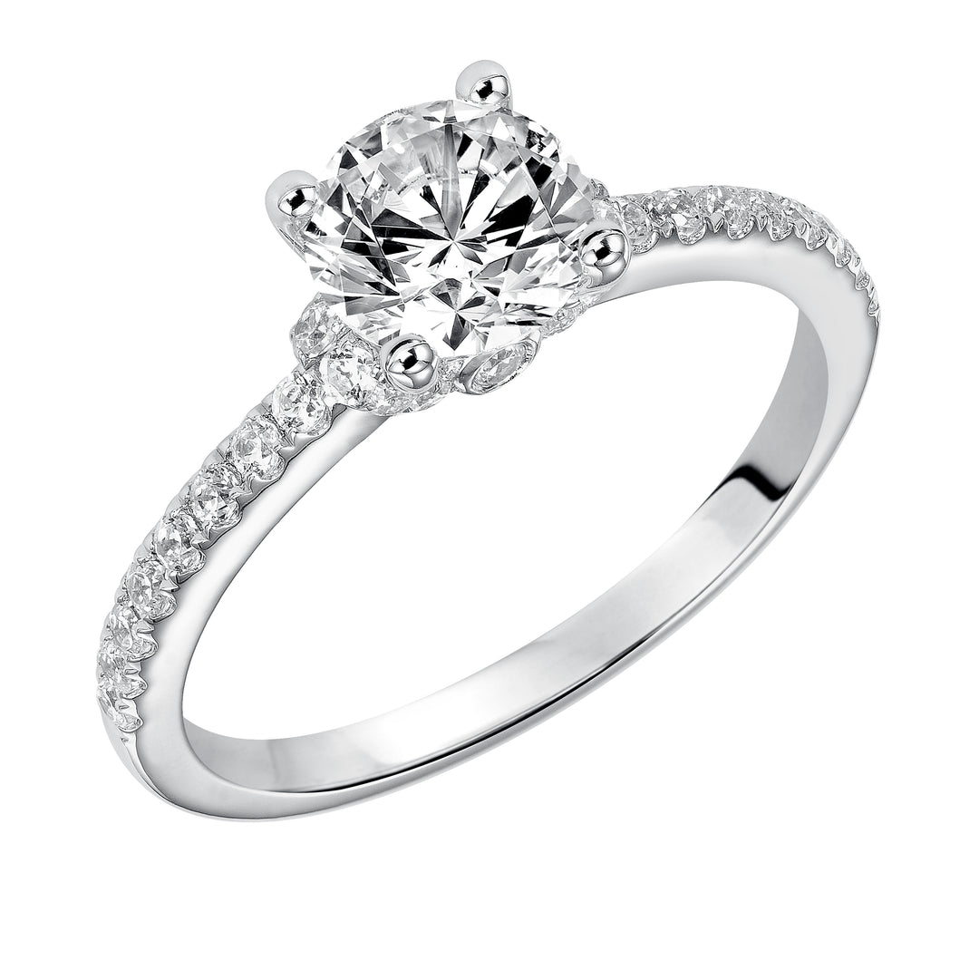 This engagement ring celebrates classic elegance with its delicate diamond prong set band and diamond tiara accent.  Center Stone is not included.