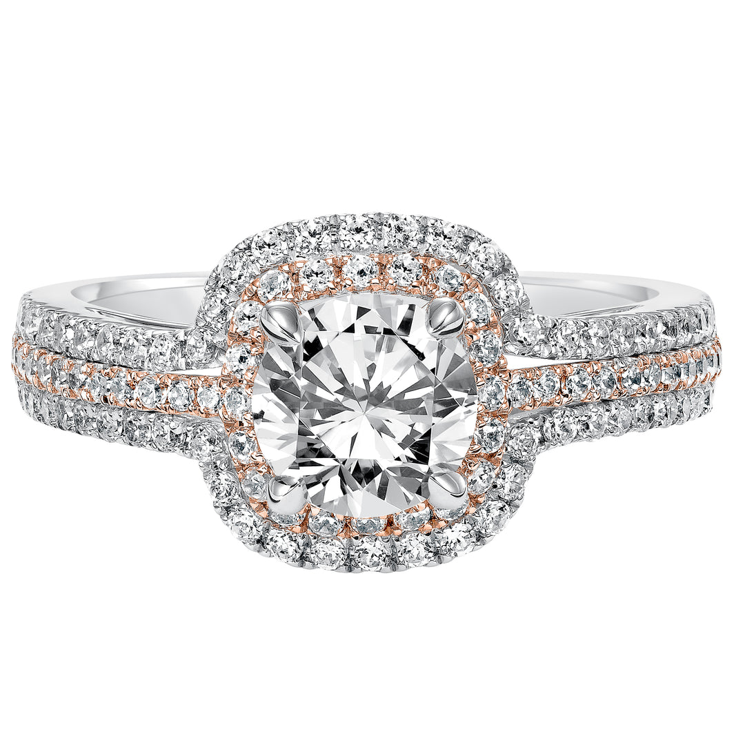 This engagement ring is truly breathtaking featuring both rose and white gold in its prong set diamond double halo and three row band design .  Center Stone is not included.