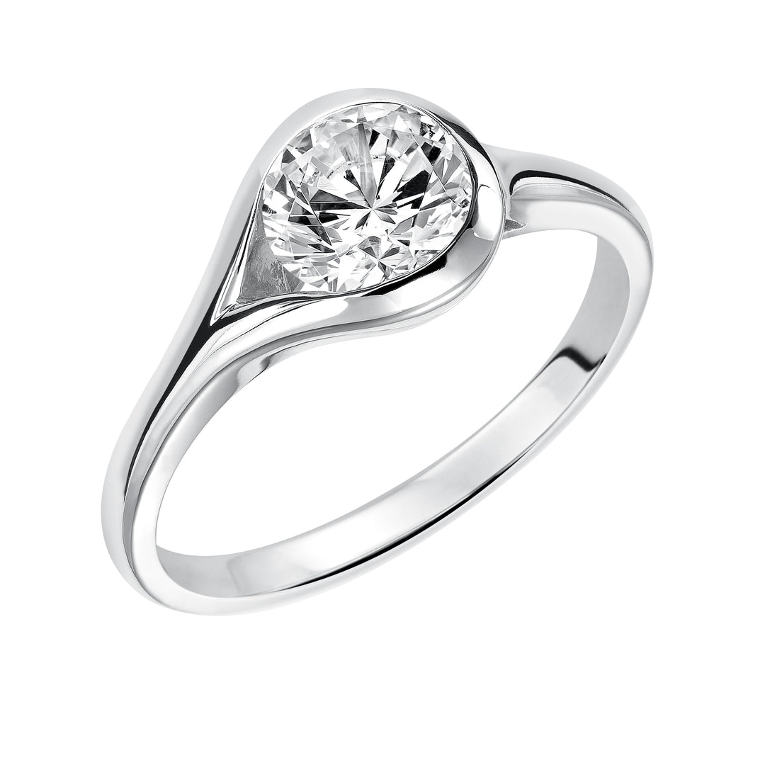 Chic and modern, this engagement ring is set beautifully in a high polished bezel set and bypass designed band.  Center Stone is not included.