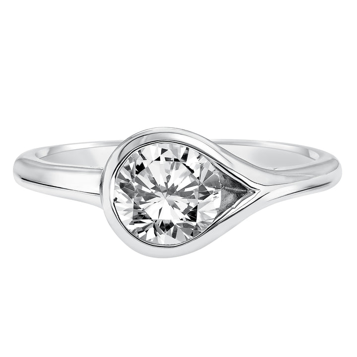 Chic and modern, this engagement ring is set beautifully in a high polished bezel set and bypass designed band.  Center Stone is not included.