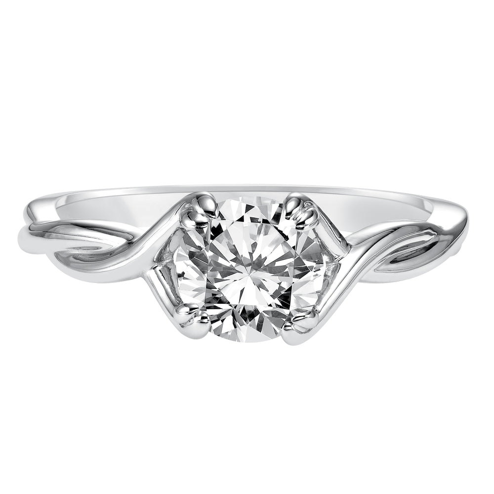 This ribbon-twist inspired high polished band gracefully accentuates the center diamond.  Center Stone is not included.