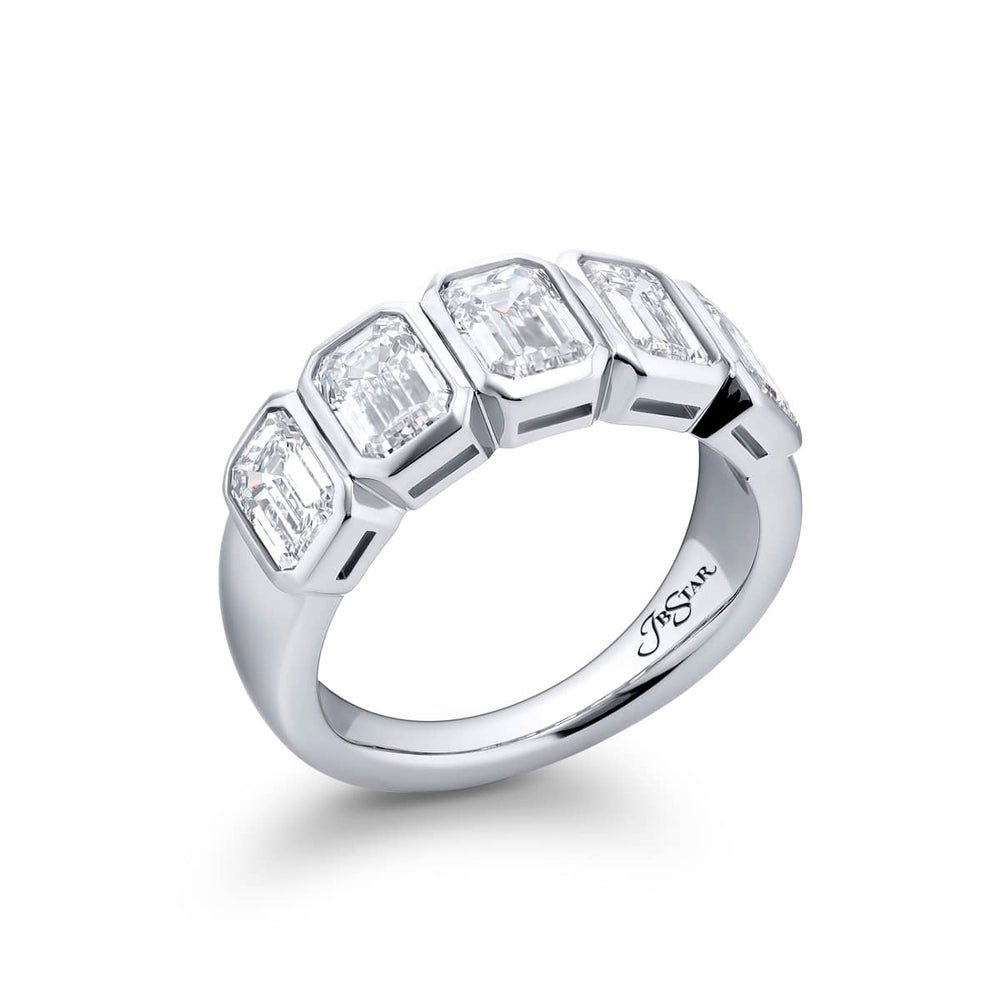 Elegance Elevated: Our signature 3.12 ctw. GIA certified Bezel Diamond Band. These five gorgeous emerald-cut diamonds are handcrafted in pure platinum.