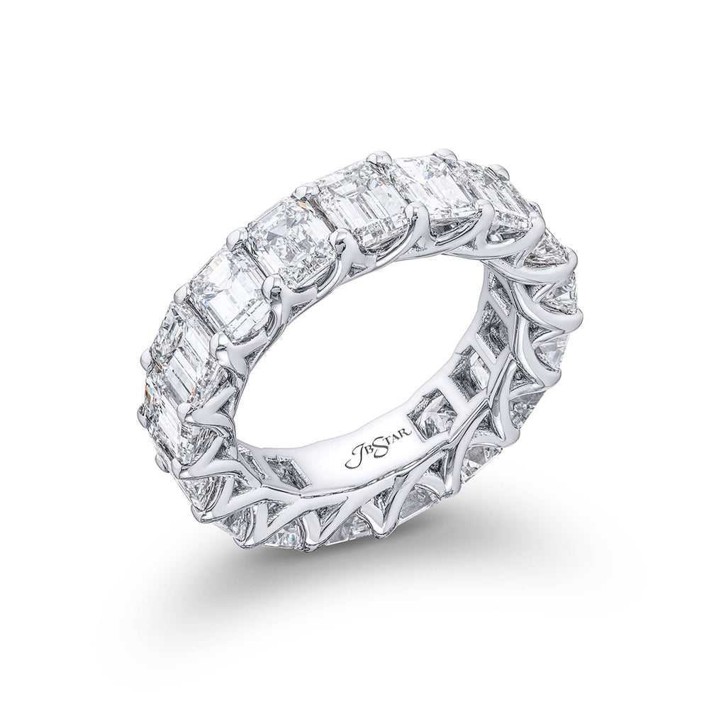 Indulge in pure elegance with our exquisite 17-stone emerald-cut diamond eternity band. Each diamond sparkles brilliantly in a shared prong setting. Meticulously handcrafted in pure platinum it epitomizes everlasting beauty and sophistication.