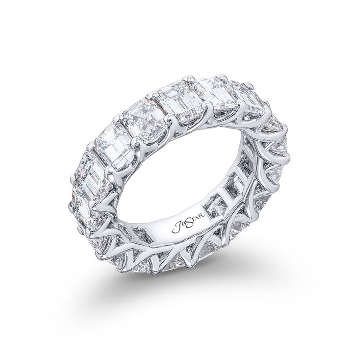 Indulge in pure elegance with our exquisite 17-stone emerald-cut diamond eternity band. Each diamond sparkles brilliantly in a shared prong setting. Meticulously handcrafted in pure platinum it epitomizes everlasting beauty and sophistication.