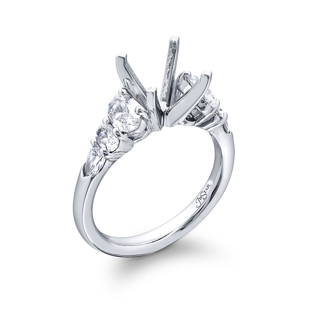 Dazzling Brilliance: Our timeless Diamond Semi-mount. These two shield diamonds accompanied by four beautiful oval diamonds are handcrafted in pure platinum.