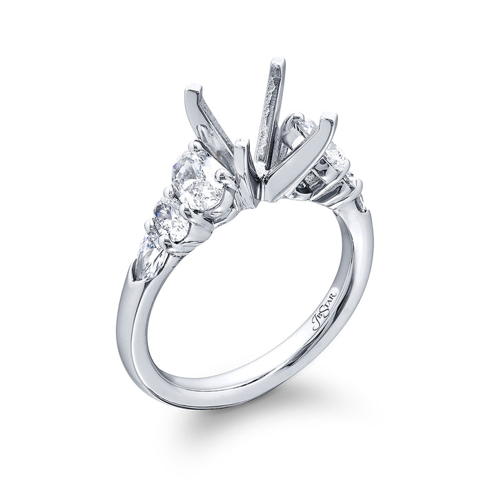 Dazzling Brilliance: Our timeless Diamond Semi-mount. These two shield diamonds accompanied by four beautiful oval diamonds are handcrafted in pure platinum.