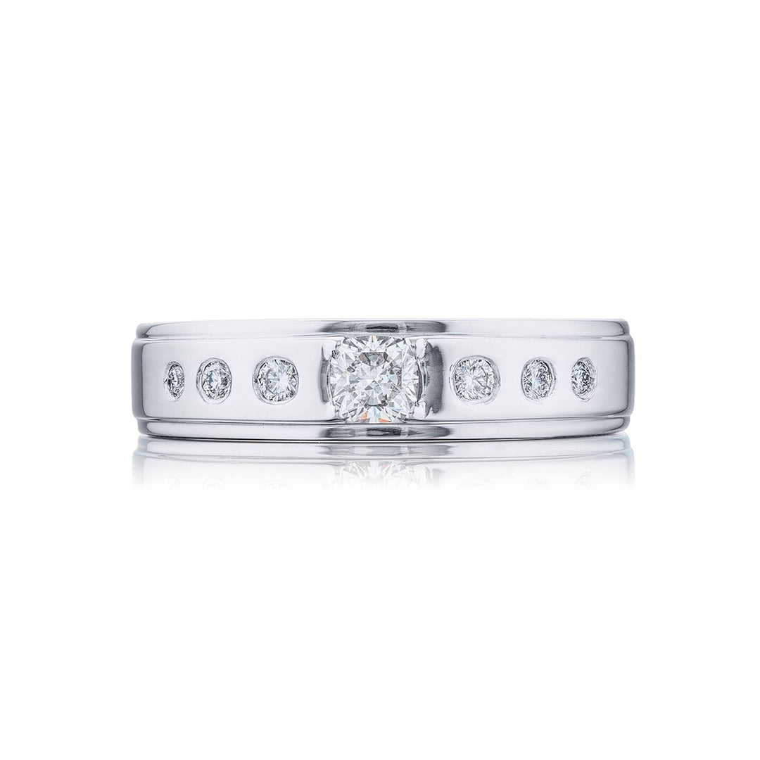 Suave Sophistication: Our dapper Bezel Set Diamond Gentleman?s Band. This cushion-cut diamond center blends with round diamonds and are handcrafted in pure platinum.
