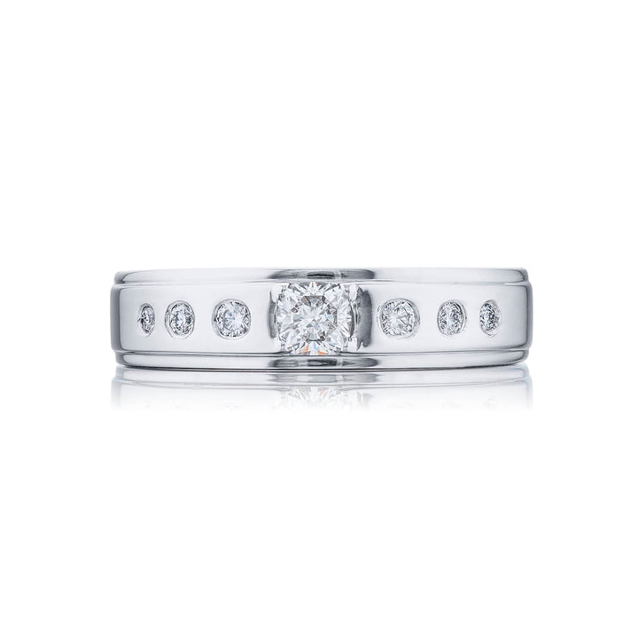 Suave Sophistication: Our dapper Bezel Set Diamond Gentleman?s Band. This cushion-cut diamond center blends with round diamonds and are handcrafted in pure platinum.
