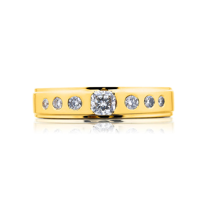 Suave Sophistication: Our dapper Bezel Set Diamond Gentleman?s Band. This cushion-cut diamond center blends with round diamonds and are handcrafted in 18KY gold.