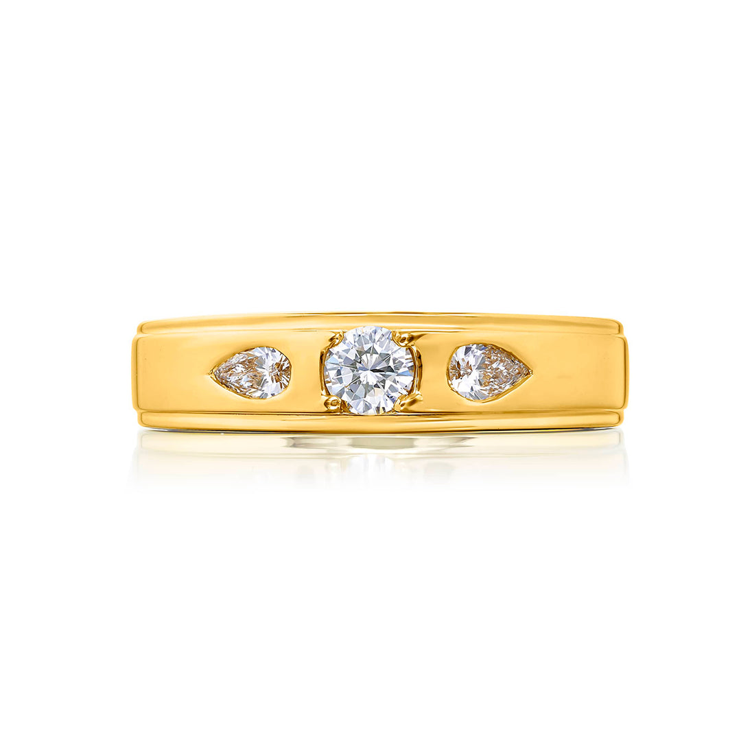 Suave Sophistication: Our dapper Bezel Set Diamond Gentleman?s Band. This round diamond center accompanied by pear-shaped diamonds is handcrafted in 18KY gold.