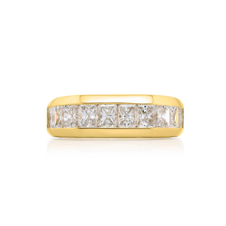 Suave Sophistication: Our dapper 3.76 ctw. Channel Set Diamond Gentleman?s Band. These twelve beautiful radiant-cut diamonds are handcrafted in 18KY gold.