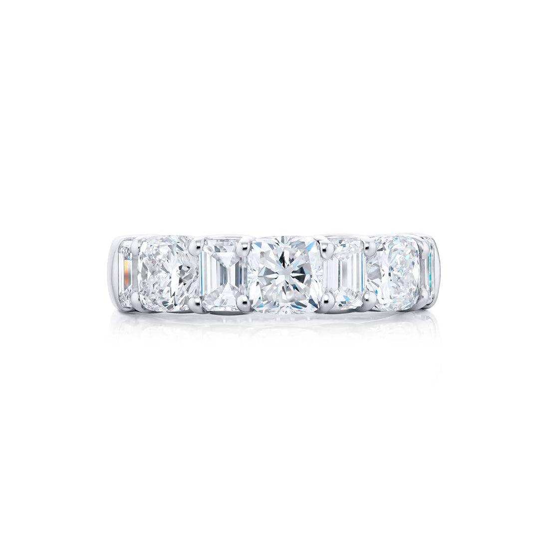Elegance Elevated: Our signature 2.75 ctw. Diamond Band. These beautiful emerald-cut diamonds blended with cushion-cut diamonds are handcrafted in pure platinum.