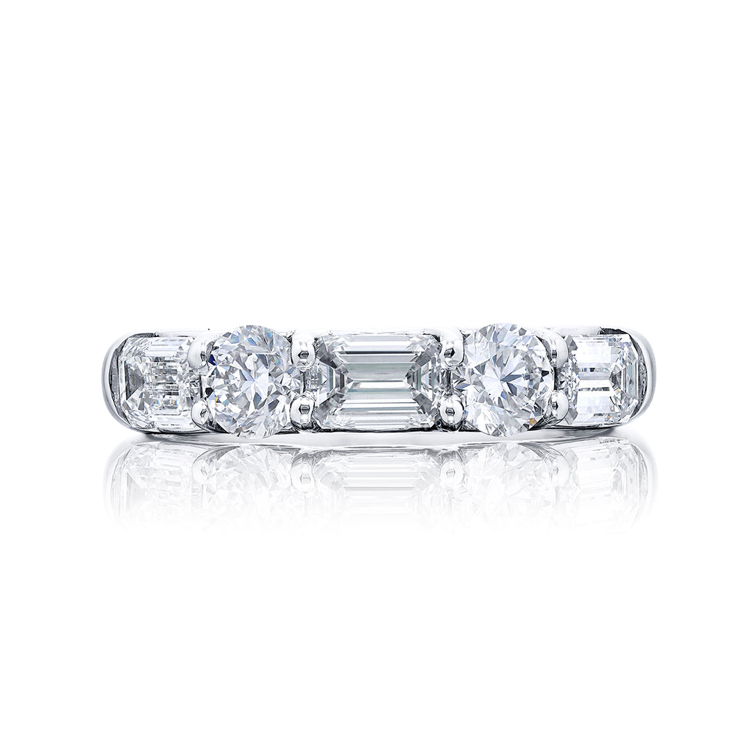 Elegance Elevated: Our classic single row East-West Diamond Band. These beautiful emerald-cut diamonds blended with round diamonds are handcrafted in pure platinum.