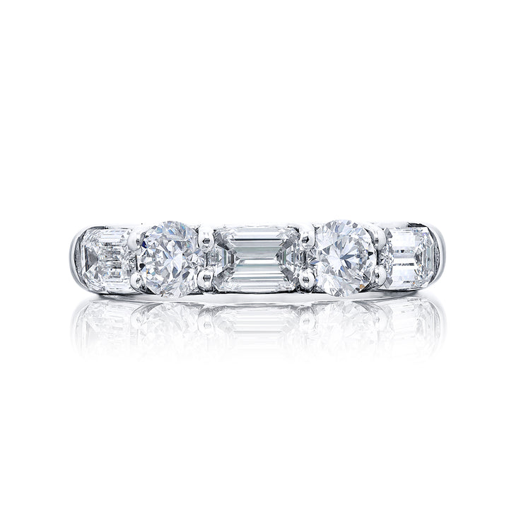 Elegance Elevated: Our classic single row East-West Diamond Band. These beautiful emerald-cut diamonds blended with round diamonds are handcrafted in pure platinum.