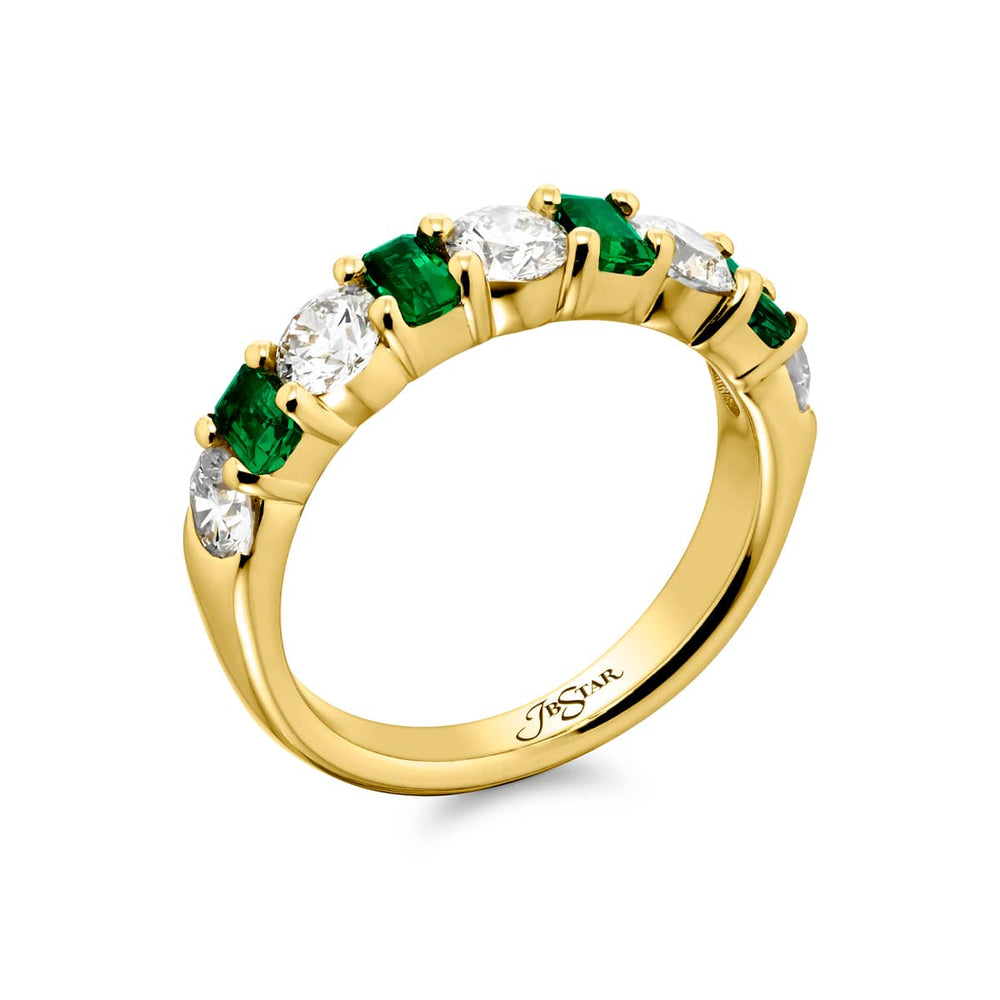 Elegance Elevated: Our signature Emerald and Diamond Band. These beautiful emerald-cut emeralds blended with dazzling round diamonds are handcrafted in 18KY gold.