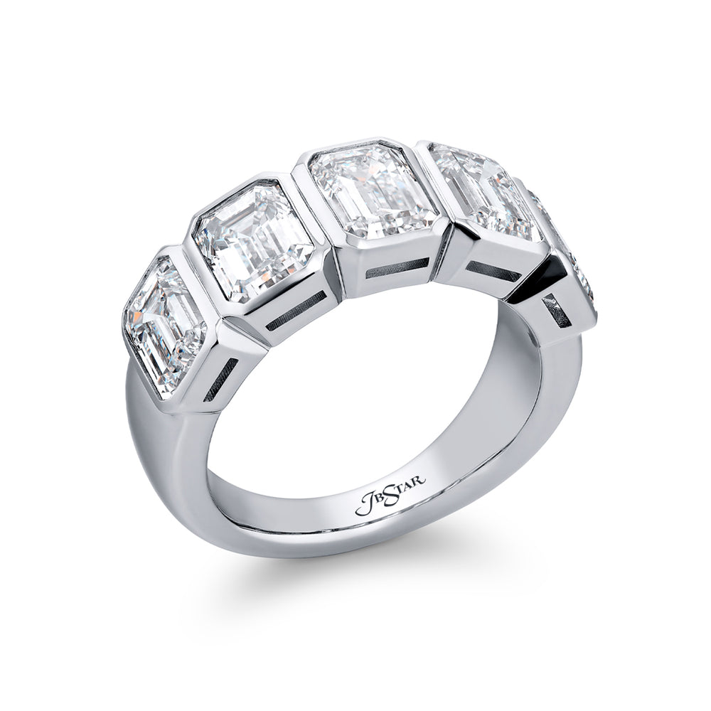 Elegance Elevated: Our stunning 5.11 ctw. GIA certified Bezel Diamond Band. These five beautiful emerald-cut diamonds are handcrafted in pure platinum.