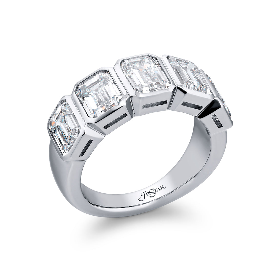 Elegance Elevated: Our stunning 5.11 ctw. GIA certified Bezel Diamond Band. These five beautiful emerald-cut diamonds are handcrafted in pure platinum.