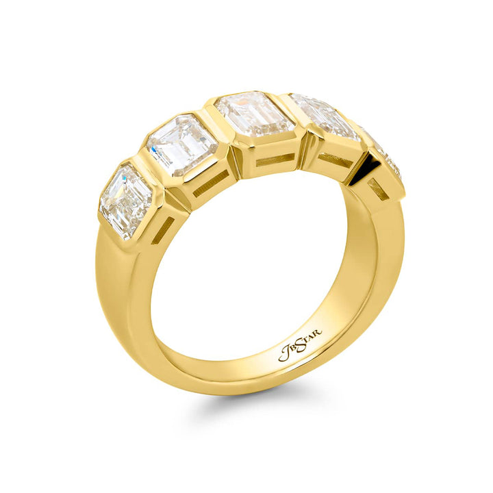 Elegance Elevated: Our stunning 3.20 ctw. Bezel Diamond Band. These five beautiful emerald-cut diamonds are handcrafted in 18KY gold.