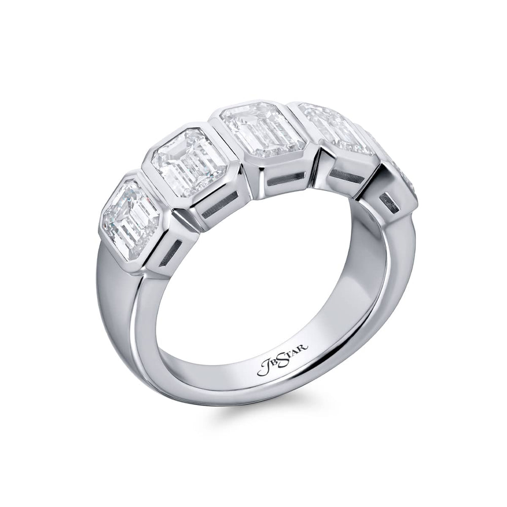 Elegance Elevated: Our stunning 3.07 ctw. Bezel Diamond Band. These five beautiful emerald-cut diamonds are handcrafted in pure platinum.