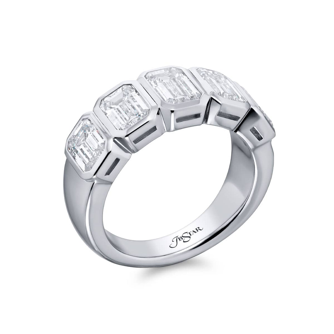 Elegance Elevated: Our stunning 3.07 ctw. Bezel Diamond Band. These five beautiful emerald-cut diamonds are handcrafted in pure platinum.