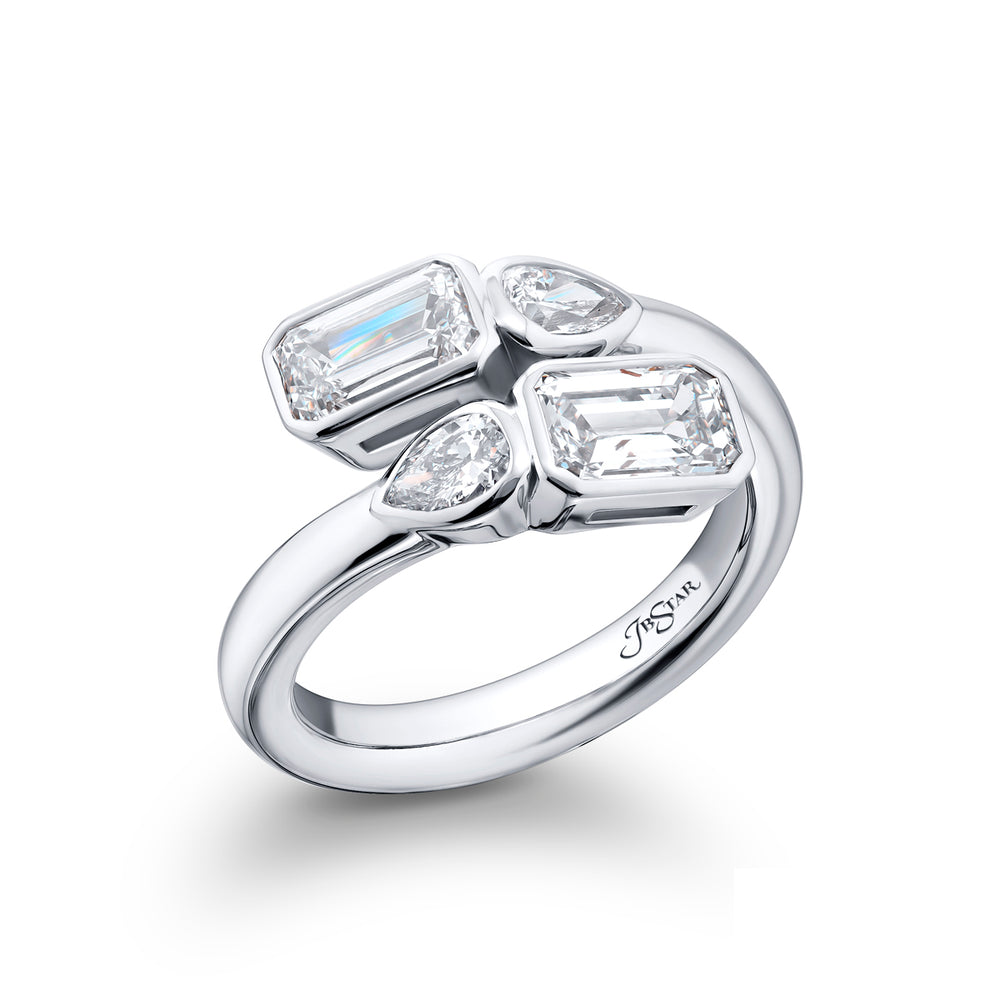 Dazzling Brilliance: Our unique 1.63 ctw. GIA certified Bezel Twogether Diamond Ring. These stunning emerald-cut diamonds accompanied by dazzling pear-shaped diamonds are handcrafted in pure platinum.