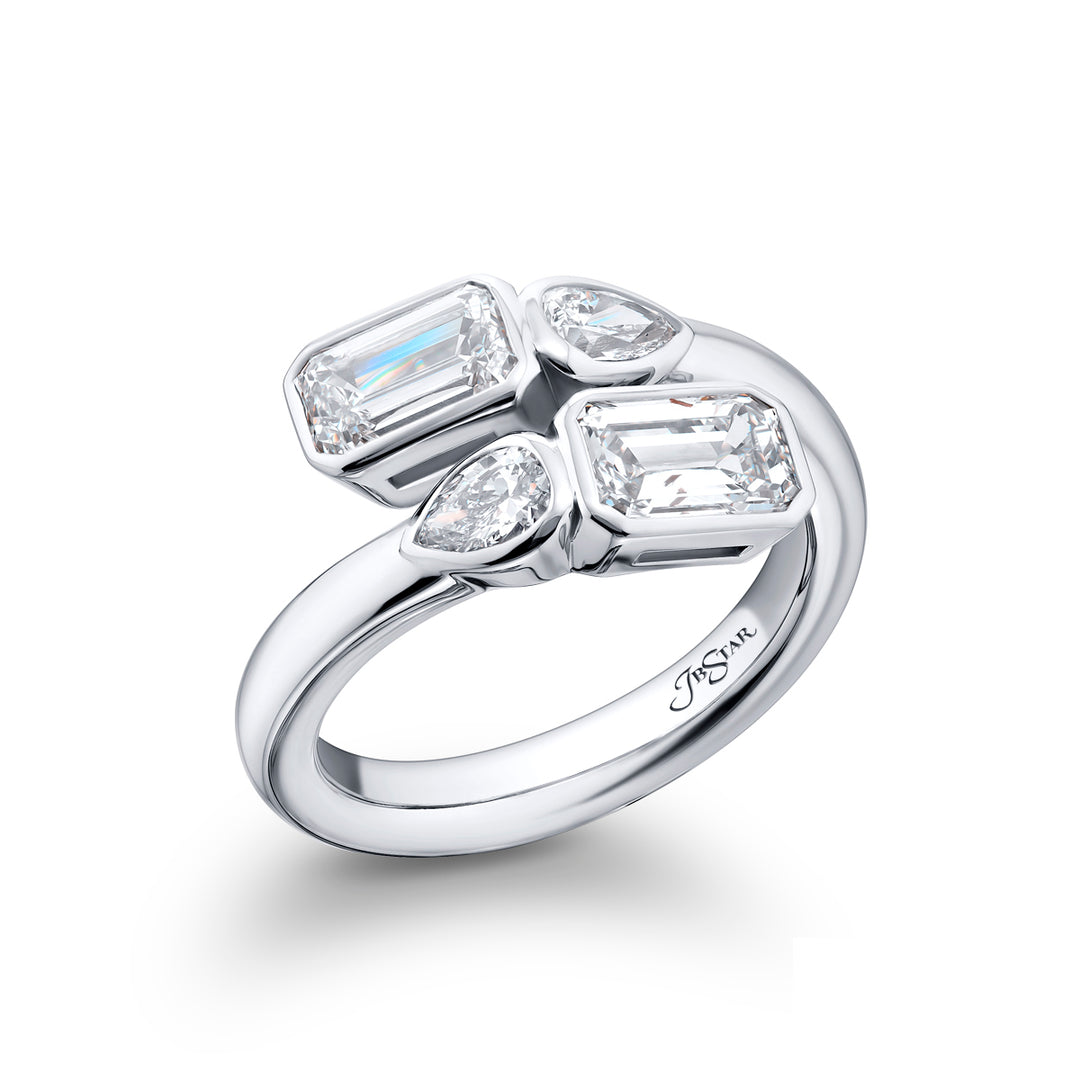 Dazzling Brilliance: Our unique 1.63 ctw. GIA certified Bezel Twogether Diamond Ring. These stunning emerald-cut diamonds accompanied by dazzling pear-shaped diamonds are handcrafted in pure platinum.