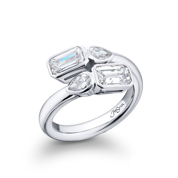 Dazzling Brilliance: Our unique 1.63 ctw. GIA certified Bezel Twogether Diamond Ring. These stunning emerald-cut diamonds accompanied by dazzling pear-shaped diamonds are handcrafted in pure platinum.