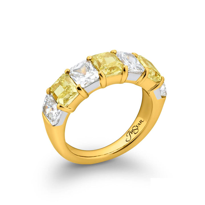 Elegance Elevated: Our classic single row Fancy Yellow & White Diamond Band. These radiant-cut fancy yellow diamonds accompany radiant-cut white diamonds and are handcrafted in 18KY gold.