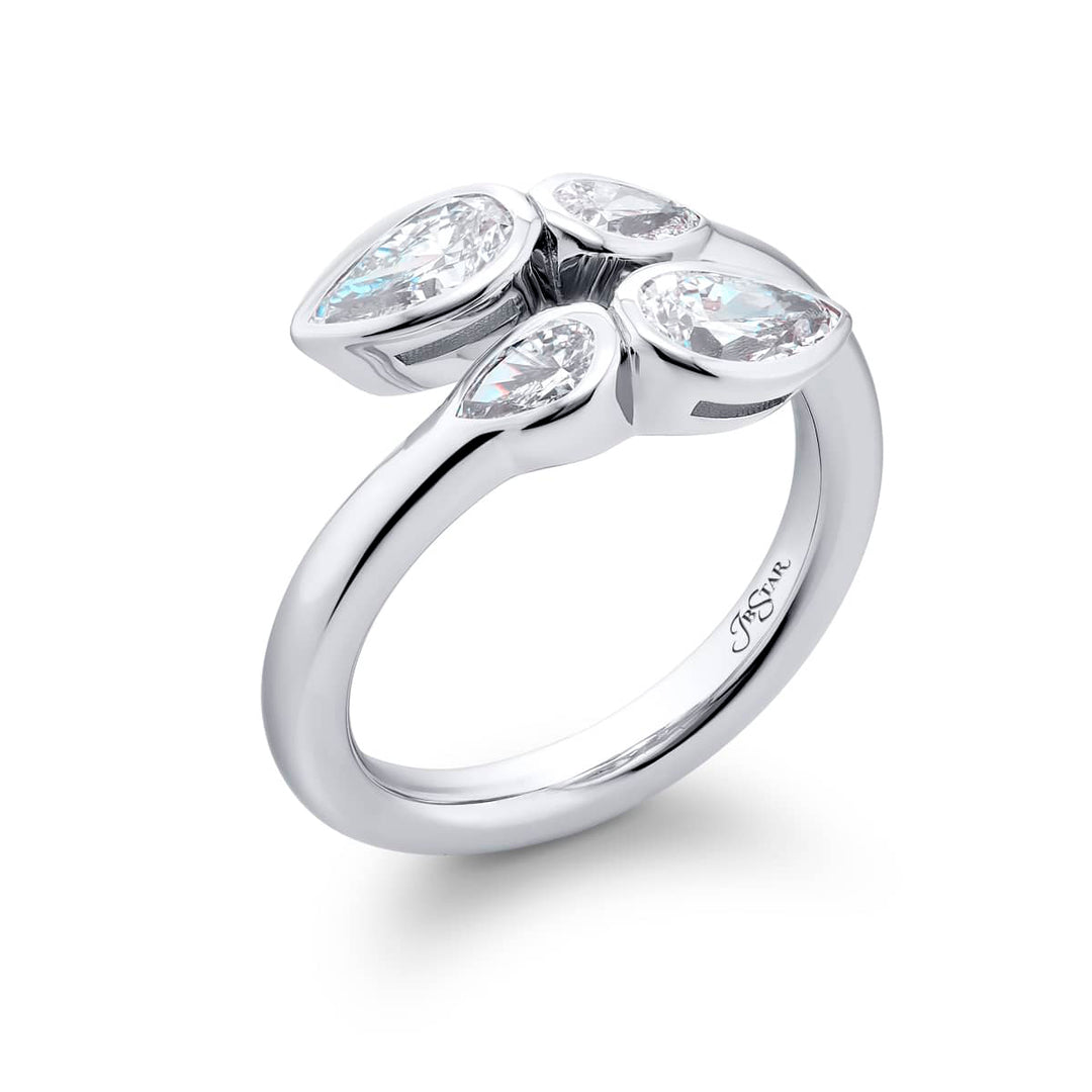 Dazzling Brilliance: Our signature 1.03 ctw. GIA certified Twogether Diamond Ring. These stunning pear-shaped diamonds accompanied by pear-shaped diamonds are handcrafted in pure platinum.