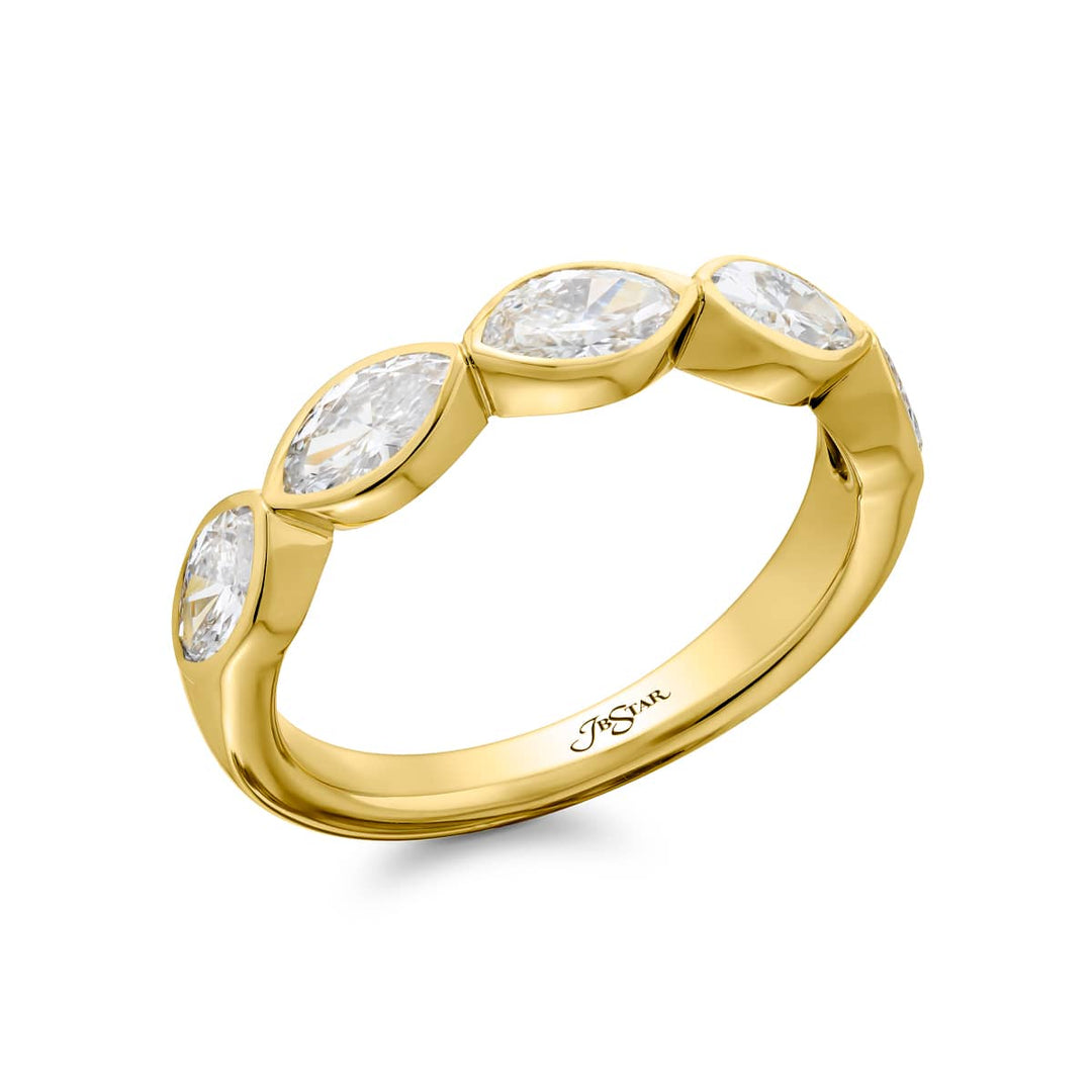 Elegance Elevated: Our stunning 1.26 ctw. East-West Bezel Diamond Band. These five beautiful marquise diamonds are handcrafted in 18K yellow gold.