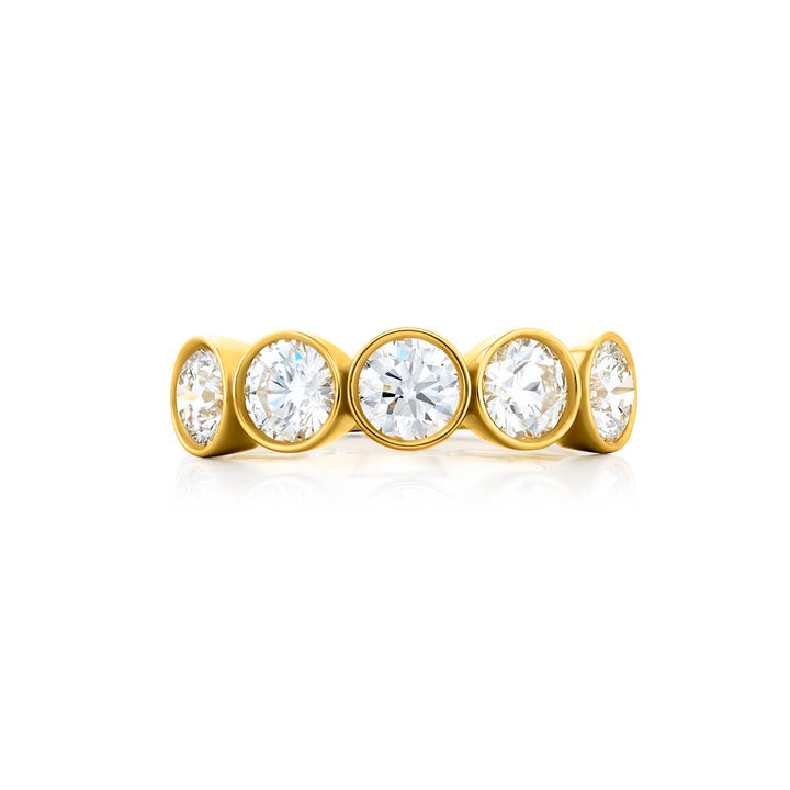 Elegance Elevated: Our signature 2.07 ctw. Bezel Diamond Band. These gorgeous round diamonds are handcrafted in 18KY gold.
