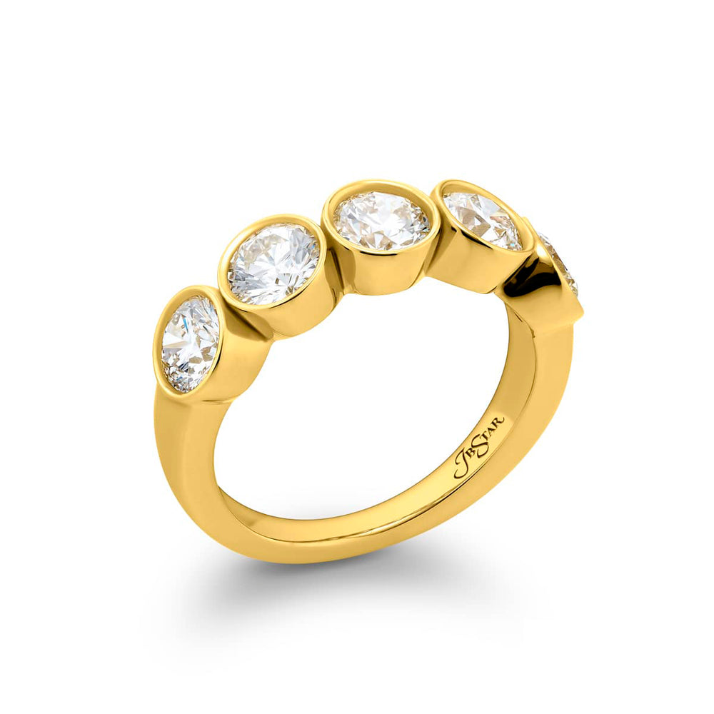 Elegance Elevated: Our signature 2.07 ctw. Bezel Diamond Band. These gorgeous round diamonds are handcrafted in 18KY gold.