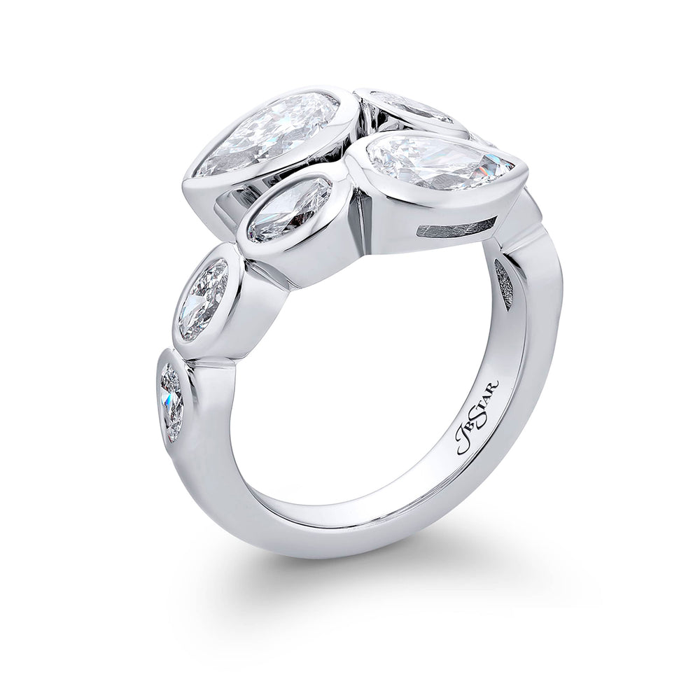 Dazzling Brilliance: Our unique 1.42 ctw. GIA certified Bezel Twogether Diamond Ring. These stunning pear-shaped diamonds accompanied by oval and pear-shaped diamonds are handcrafted in pure platinum.